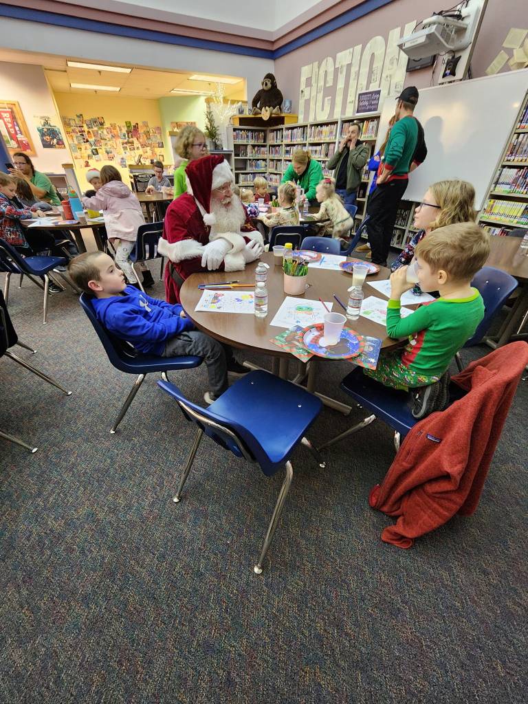 May be an image of 9 scallywags, people studying an' table