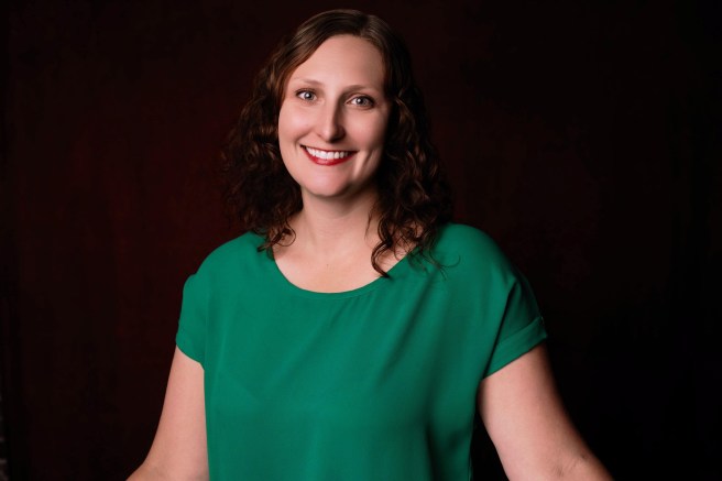 Becca Fairchild wearing a green shirt